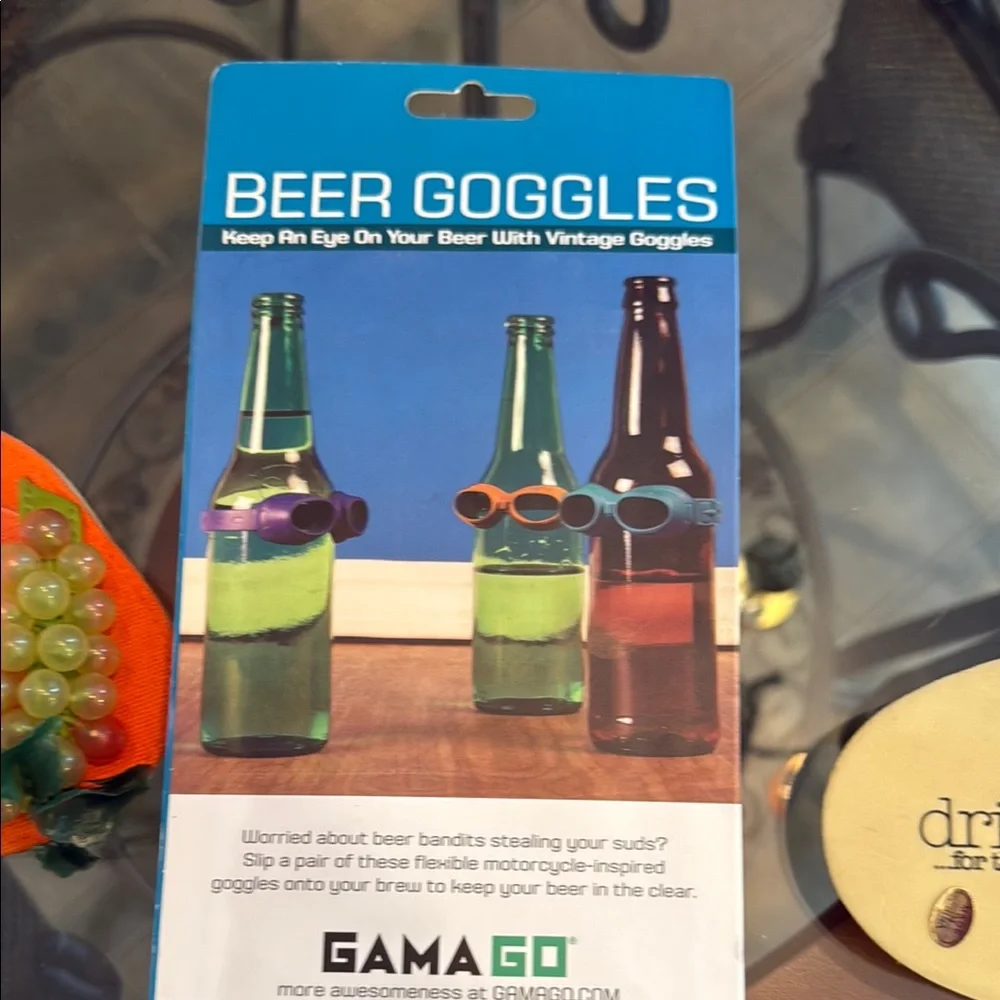 Gama Go Beer Goggles Set with wine glass footwear and lily pad wine stopper.
